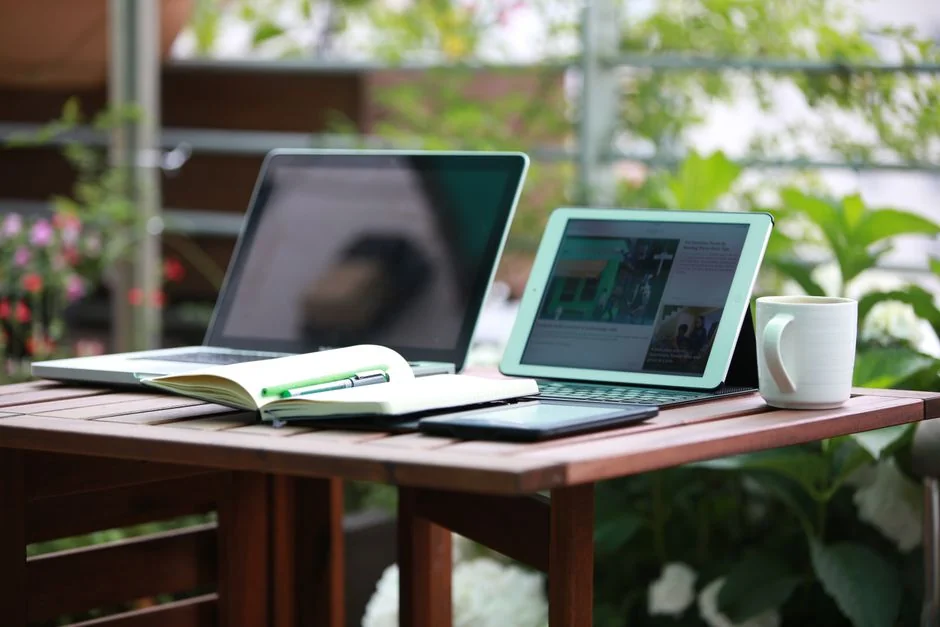 laptop-near-mug-and-computer-monitor-8wjfjqnb-90